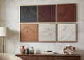 Set of six framed mountain landscapes on a wall above a wooden console table.